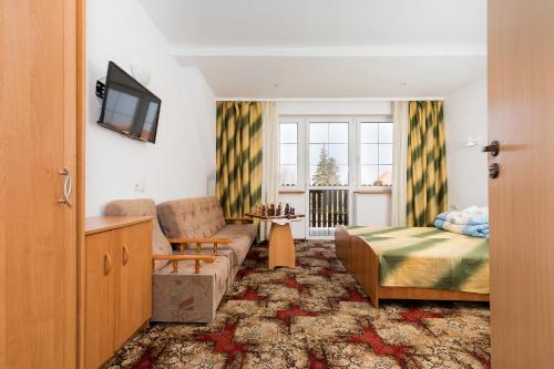 Кровать или кровати в номере Soleil Resort & SPA