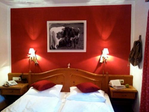 Una cama o camas en una habitación de Hotel Gamshof