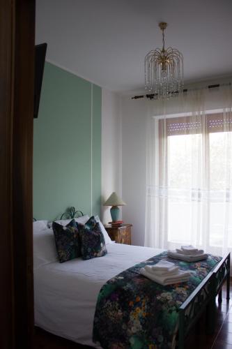 Кровать или кровати в номере City View Pescara B&B