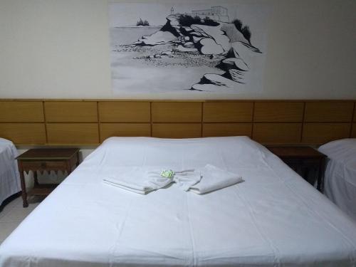 Postel nebo postele na pokoji v ubytování Summer Hotel
