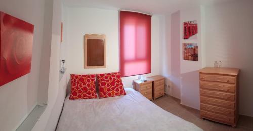A bed or beds in a room at Apart. en Calpe a 150m. de la playa