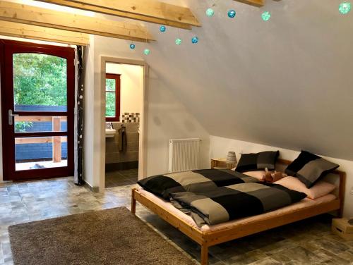 Postel nebo postele na pokoji v ubytování Guest House K74