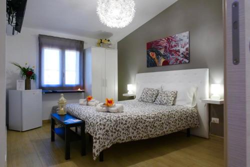 Postel nebo postele na pokoji v ubytování B&B Templi e Arte