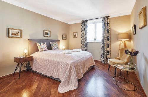 Postel nebo postele na pokoji v ubytování Vienna Penthouse 2