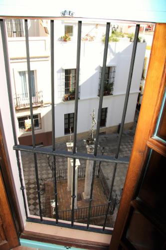 a view from a window of a courtyard at Hotel Patio de las Cruces in Seville