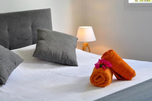 Postel nebo postele na pokoji v ubytování L'Hacienda - Vue Mer et piscine privée