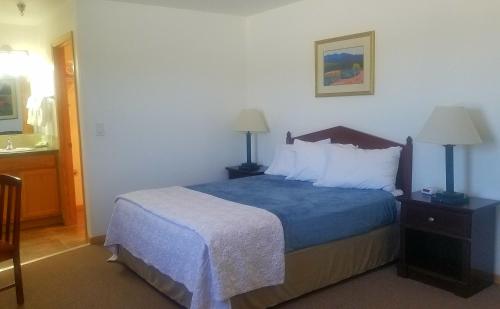 Katil atau katil-katil dalam bilik di Howard's Motel