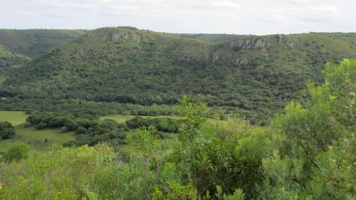 a mountain view from the top of a hill at Hostería La Bordona in Rivera