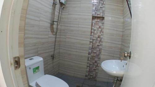 Koupelna v ubytování Beinte Singko de Marso Apartments