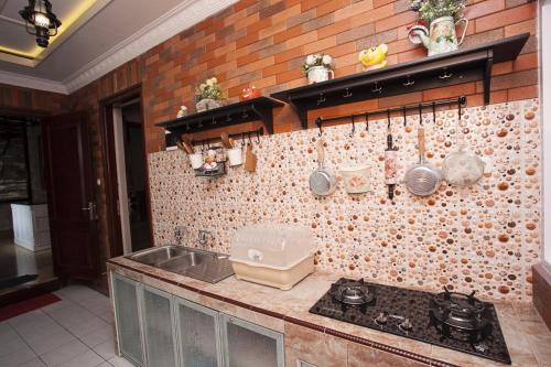 Kuchyň nebo kuchyňský kout v ubytování Huis Van Gustafine Floor 1