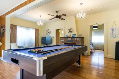 A pool table at Nautique Beach House