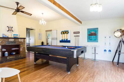 A pool table at Nautique Beach House
