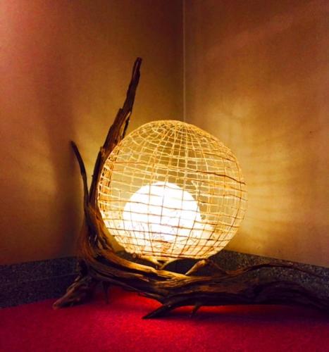 a lit up disco ball sitting on top of a table at Seiryuso in Misasa