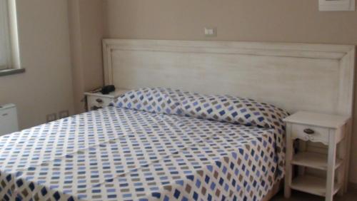 Katil atau katil-katil dalam bilik di B&B Lo Scoiattolo del Pollino