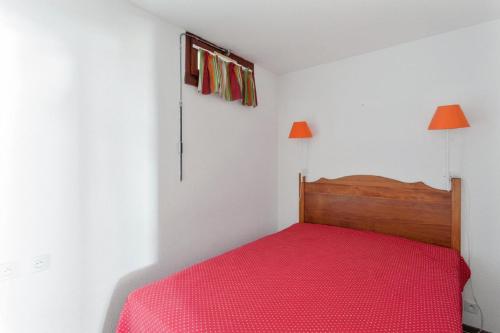 Ένα ή περισσότερα κρεβάτια σε δωμάτιο στο Residence Les Melezes - maeva Home