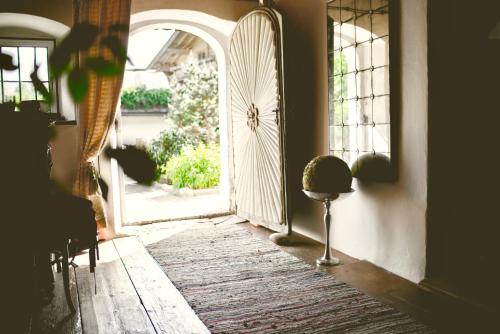 an entrance to a room with an open door at Bauernhaus-Schloss Wagrain in Ebbs