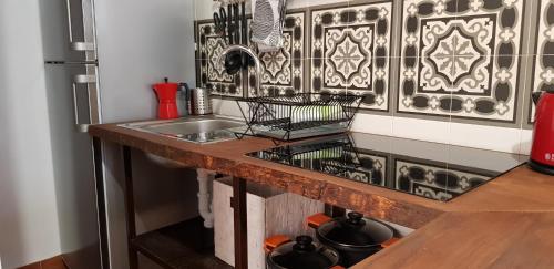 Kuchyň nebo kuchyňský kout v ubytování La Sultana Apartamentos