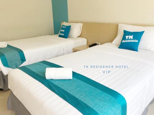 Postel nebo postele na pokoji v ubytování TK residence