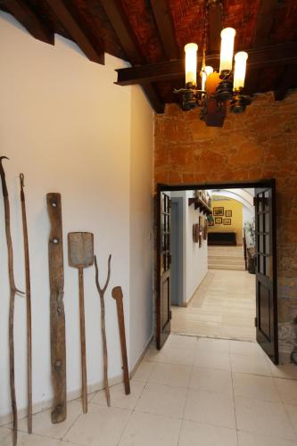 a hallway with artifacts on the wall in a building at Centrum Hotel - City Center in Nicosia