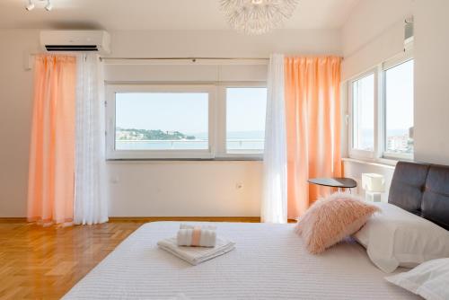 Posteľ alebo postele v izbe v ubytovaní Apartment Sun & Sea