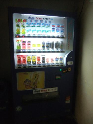 a vending machine filled with drinks and drinks at Hotel Kokusai Plaza (Kokusai-Dori) in Naha