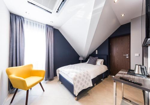 Postel nebo postele na pokoji v ubytování Hotel Tommasi