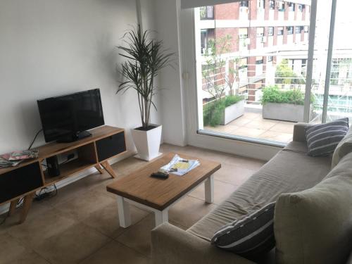 Uma área de estar em My Place apartamentos - BELGRANO