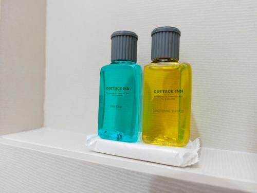 two bottles of soap sitting on a shelf at Sun Inns Hotel Subang in Subang Jaya
