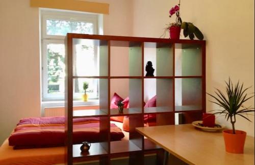 A bed or beds in a room at Heart of INN‘s Bruck
