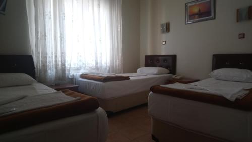 Isık Hotelにあるベッド