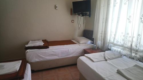 Isık Hotelにあるベッド