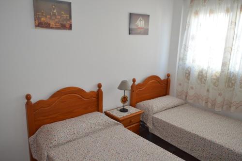 Postel nebo postele na pokoji v ubytování Hnos Navarrete
