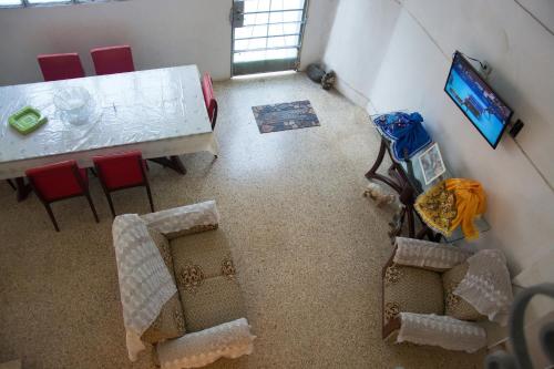 an overhead view of a living room with a table and chairs at Hostal Corona in Havana