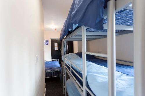 a bunk bed with two bunk beds in a room at Fenham Hotel express in Newcastle upon Tyne