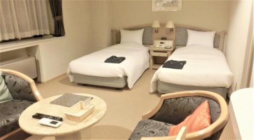 Una cama o camas en una habitación de Hotel Cypress Karuizawa