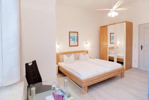 Postel nebo postele na pokoji v ubytování Pension Villa Nordland