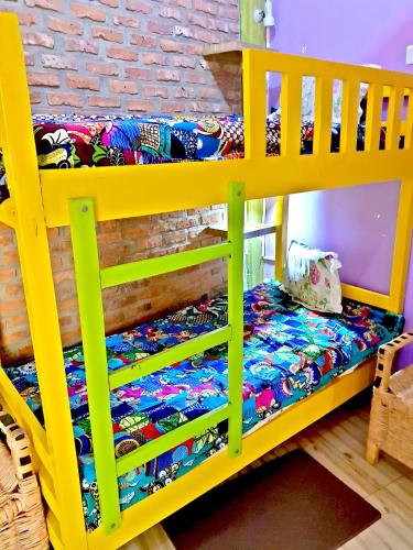 Кровать или кровати в номере Yambi Guesthouse