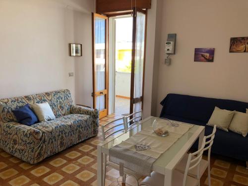 Posezení v ubytování a casa di Manu