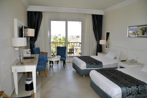 Giường trong phòng chung tại Il Mercato Hotel & Spa