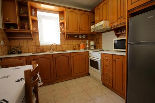 Cozy Apartment tesisinde mutfak veya mini mutfak