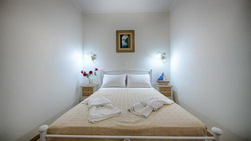 Feakia apartment 2にあるベッド