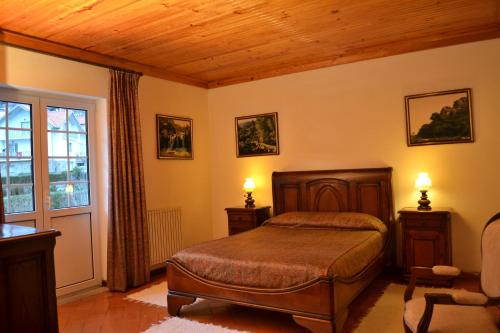 En eller flere senge i et værelse på Casa da Ribeira