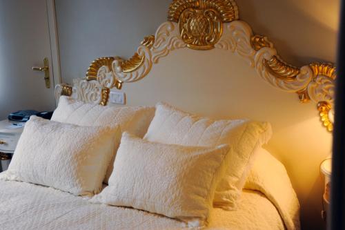 Un ou plusieurs lits dans un hébergement de l'établissement Hotel Bertaso