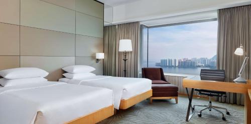Una cama o camas en una habitación de Hyatt Regency Hong Kong, Sha Tin