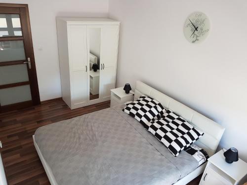 En eller flere senger på et rom på Apartament Bocianie Gniazdo