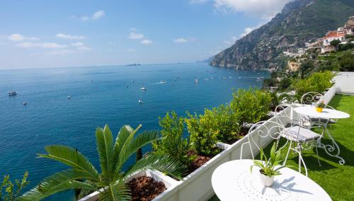 a view of the amalfi coast from a balcony at Villa Pietra Santa in Positano