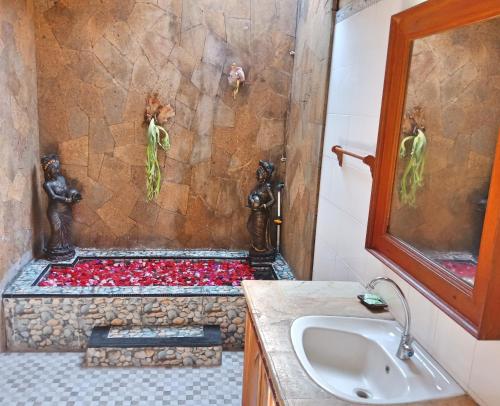 Phòng tắm tại Bungalow Geringsing