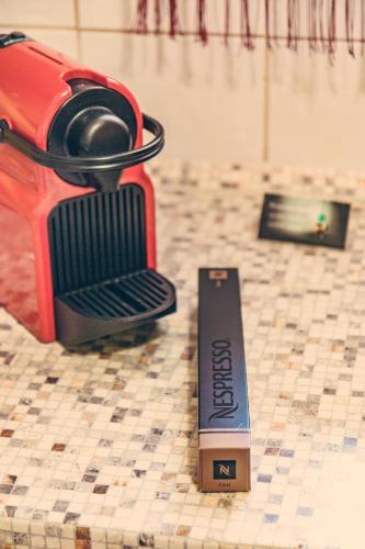 a close up of a hair dryer and a comb at Apartment on Gellért Hill Budapest Downtown with free garage & Castle View in Budapest