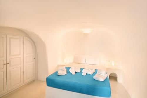 Cama ou camas em um quarto em Horizon Aeifos Suites