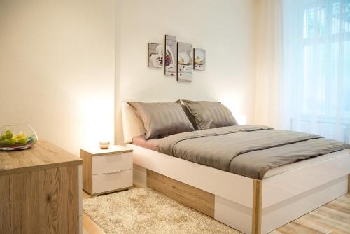 Postel nebo postele na pokoji v ubytování Apartment Aesculap